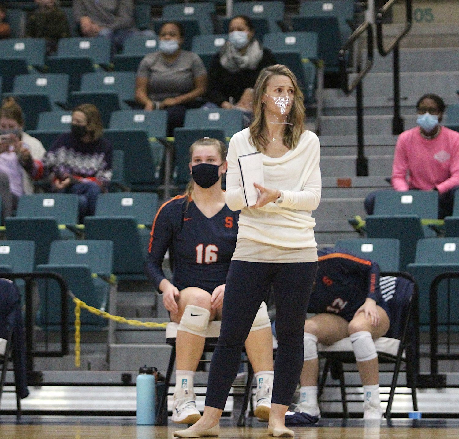 Seven Lakes volleyball coach Amy Cataline keeps an eye on her players at the team’s Class 6A regional final match against Katy High School on Dec. 4, 2020, at the Merrell Center. Seven Lakes class of 2021 graduate Kailey Bickel said at the time that she’d never seen a coach that cares about her players as much as Cataline does.